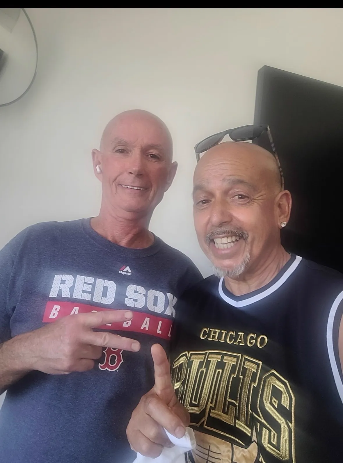 Rob G smiling with a friend in recovery at home
