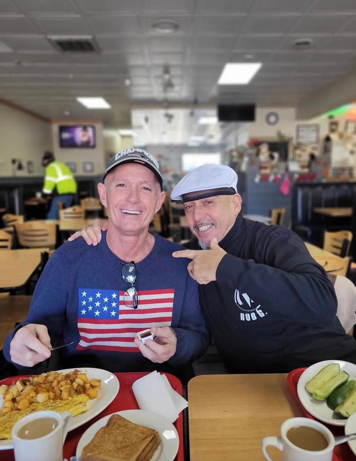 Rob G sharing breakfast with a friend from the recovery community