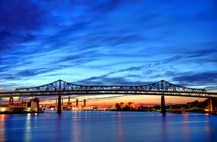 Chelsea area bridge at dusk over the water, symbolizing connection and hope