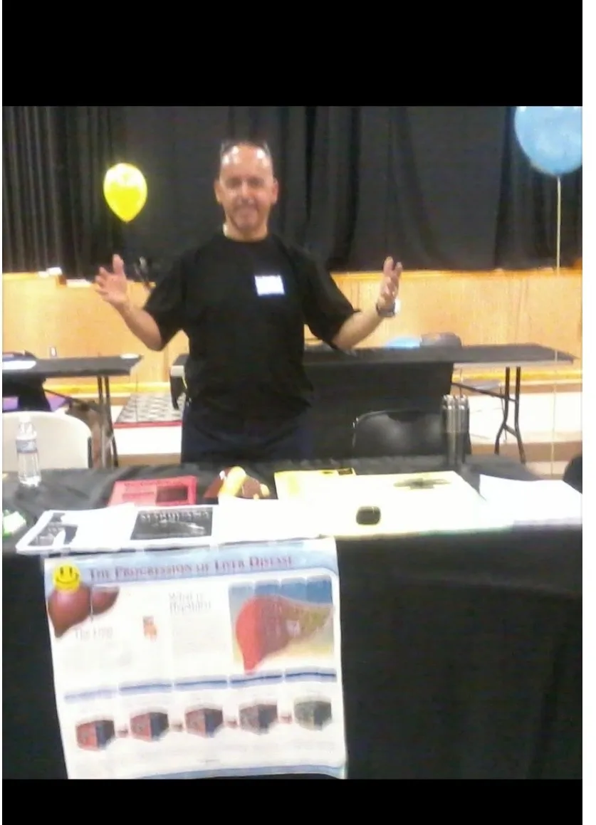 Rob G sharing recovery education at a community awareness event