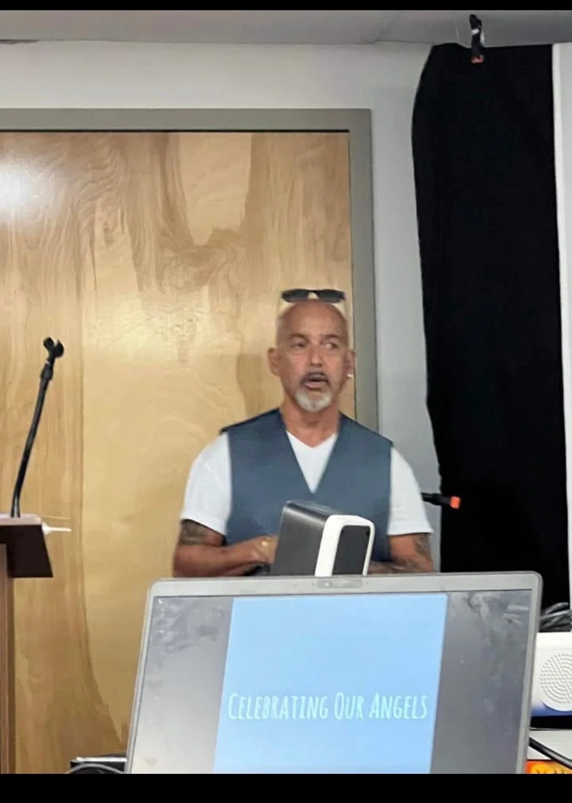 Rob G speaking at a Celebrating Our Angels community event